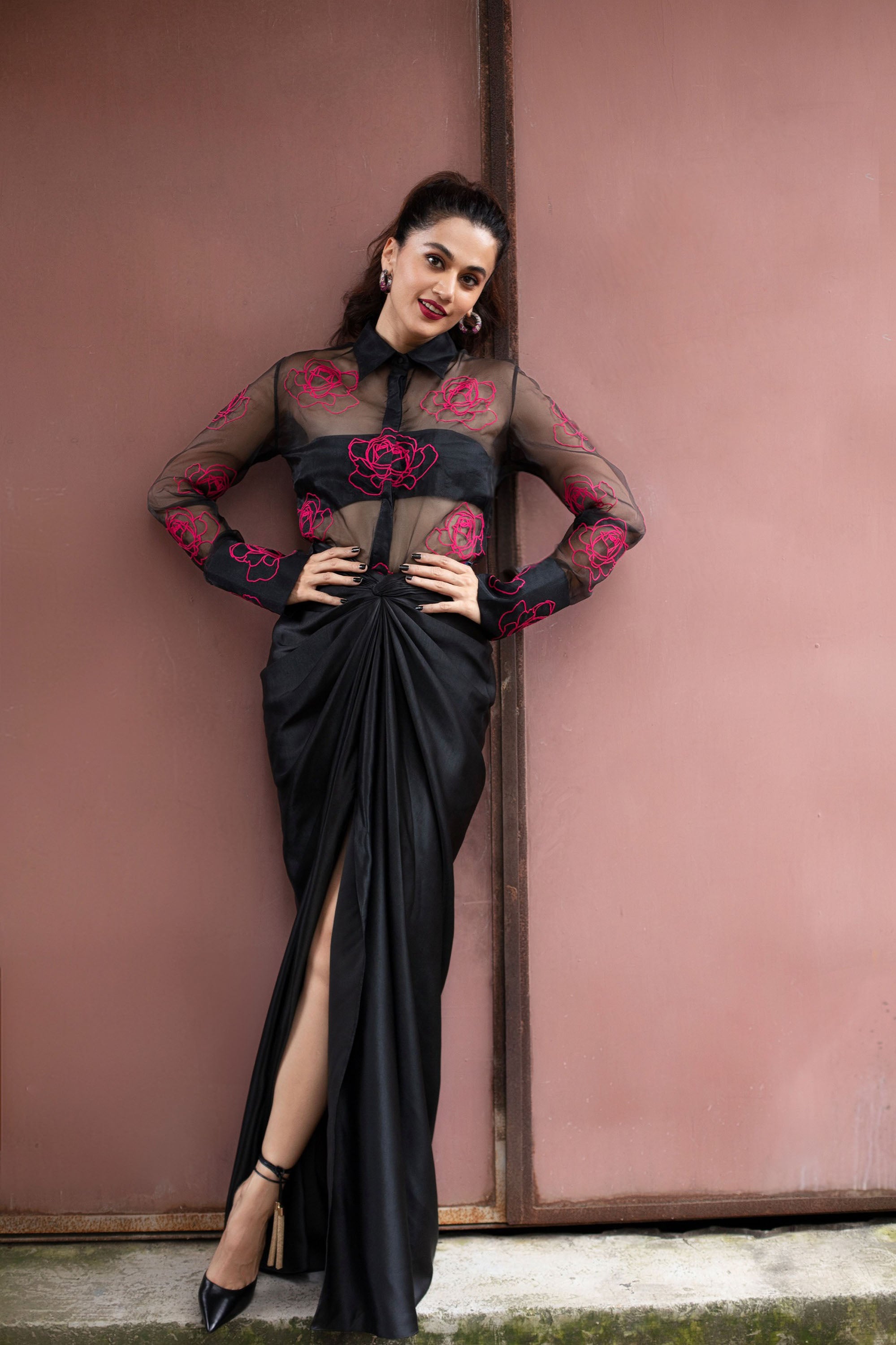 Sheer shirt with dimensional roses paired with twist skirt
