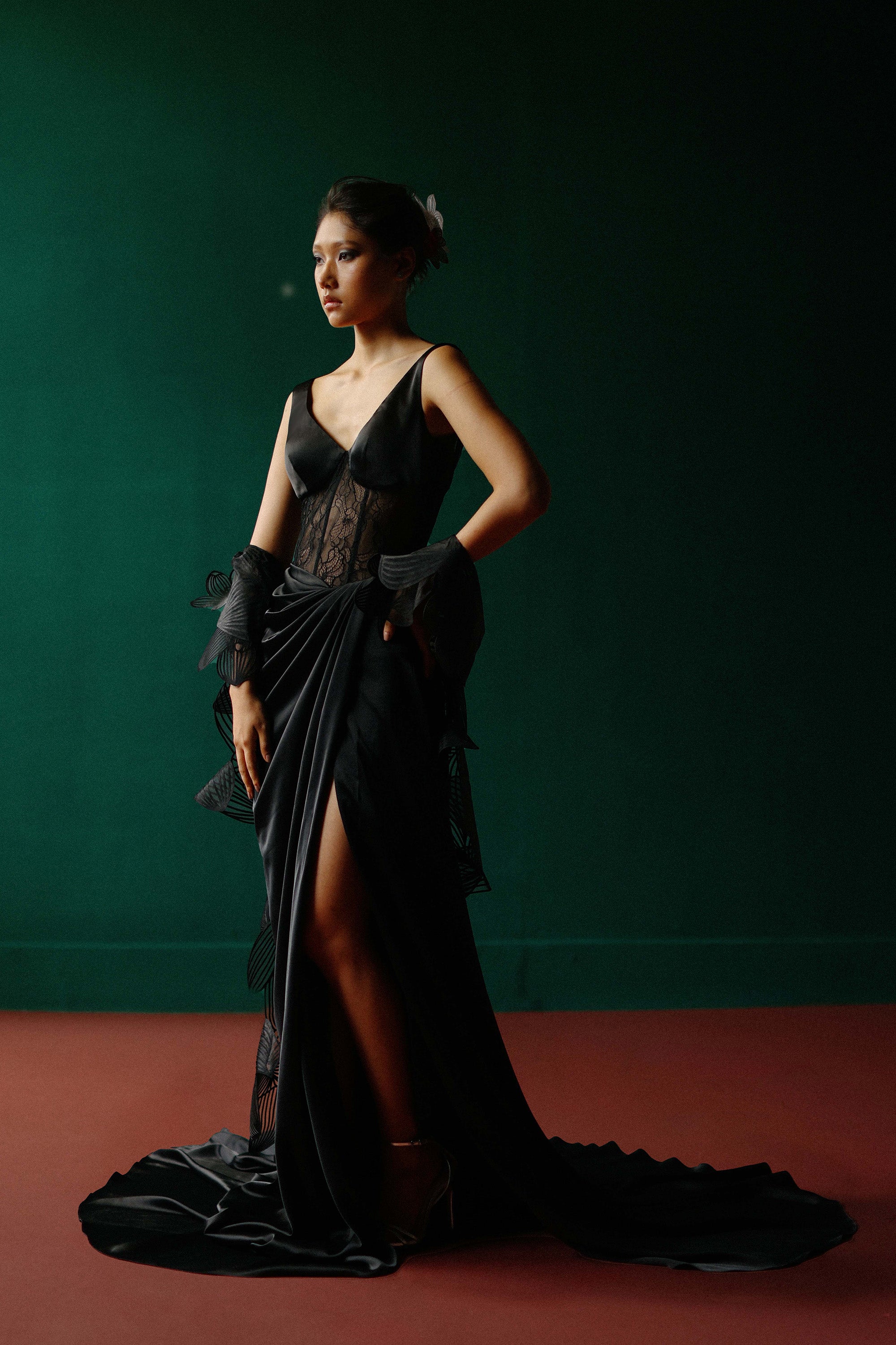 Elegant black lace corset gown with an orchid shawl