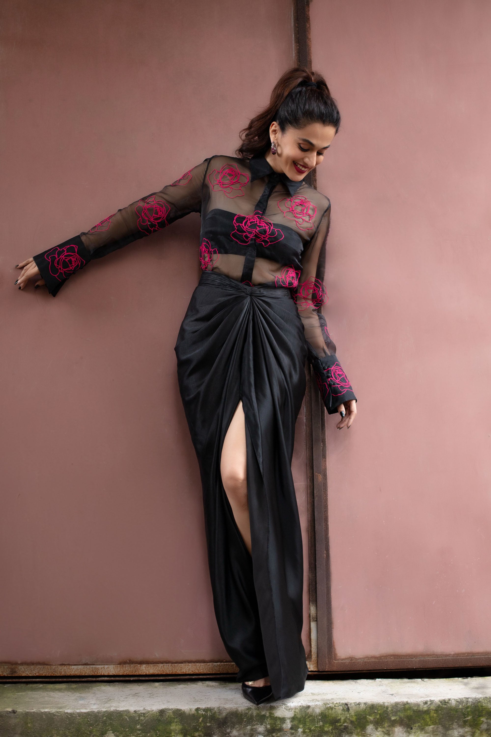 Sheer shirt with dimensional roses paired with twist skirt