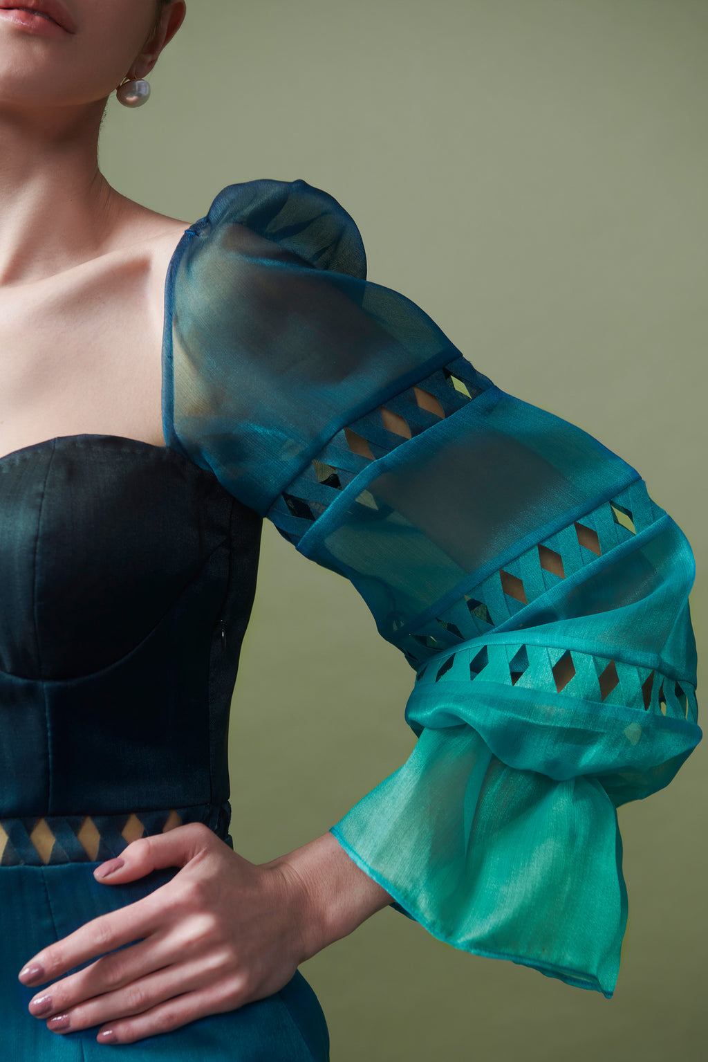 Dress with exaggerated sleeves