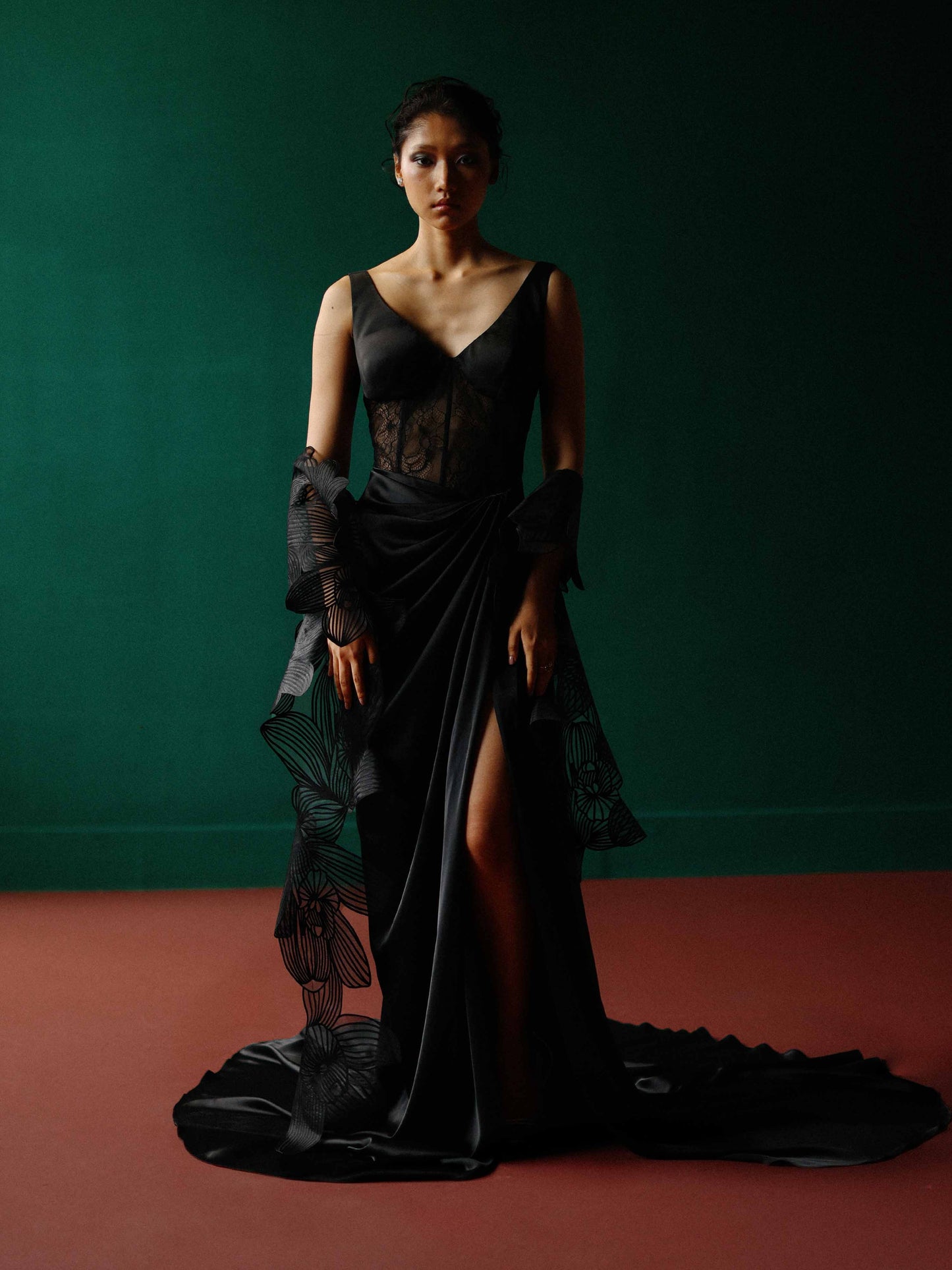 Elegant black lace corset gown with an orchid shawl