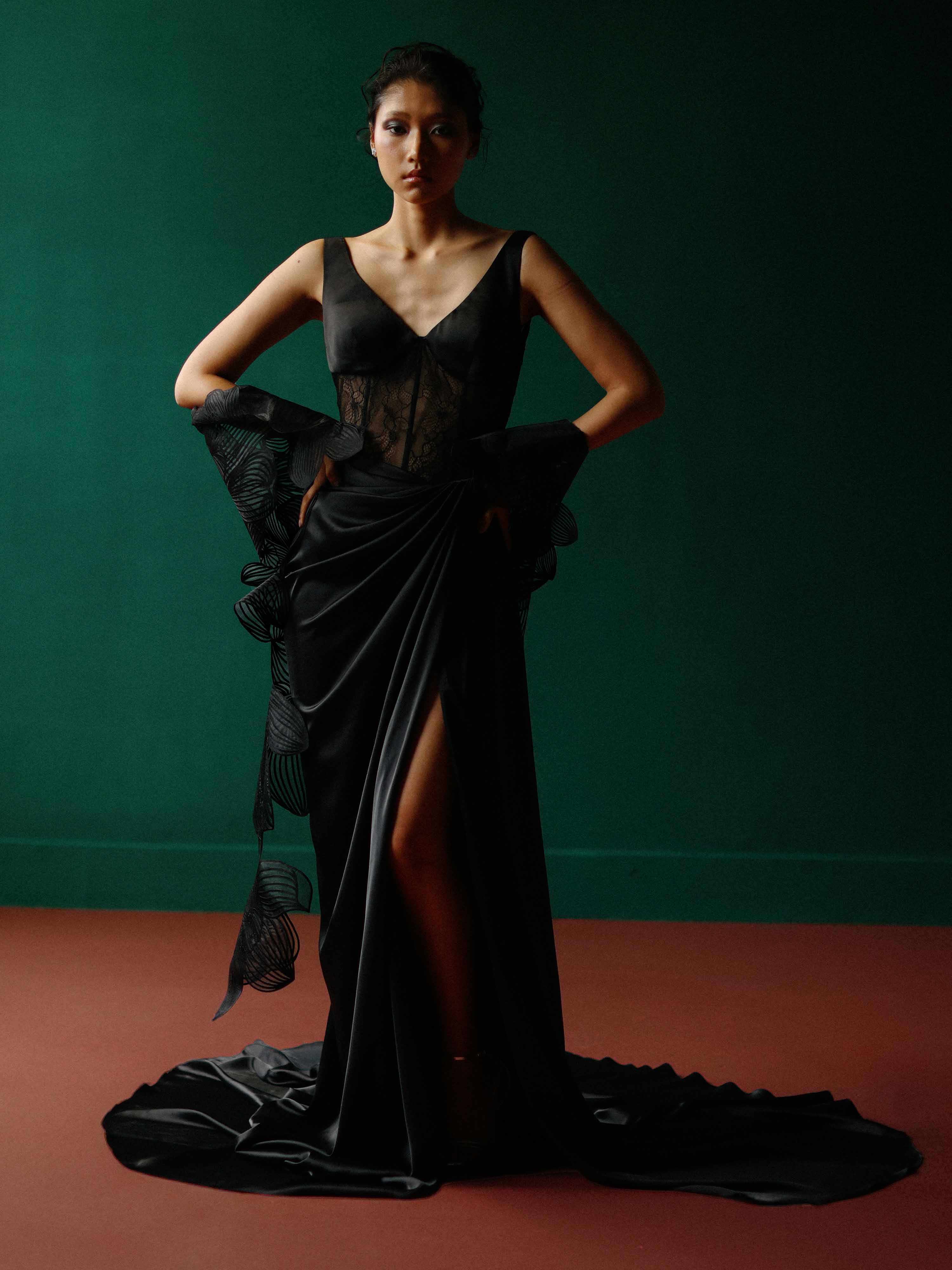 Elegant black lace corset gown with an orchid shawl
