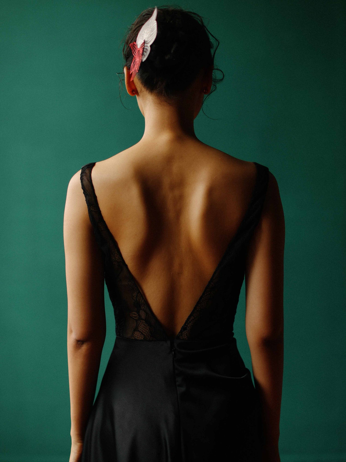 Elegant black lace corset gown with an orchid shawl