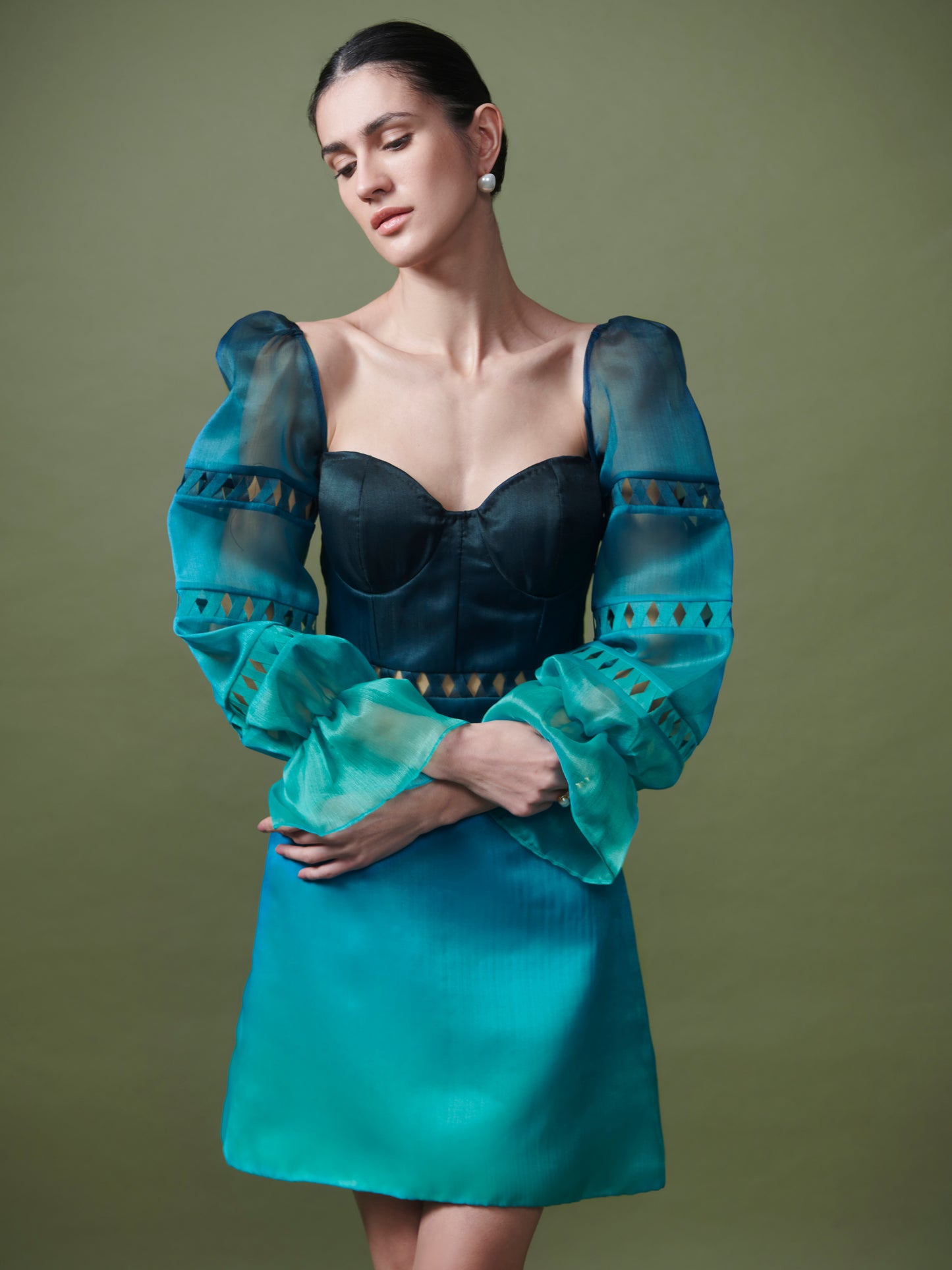 Dress with exaggerated sleeves